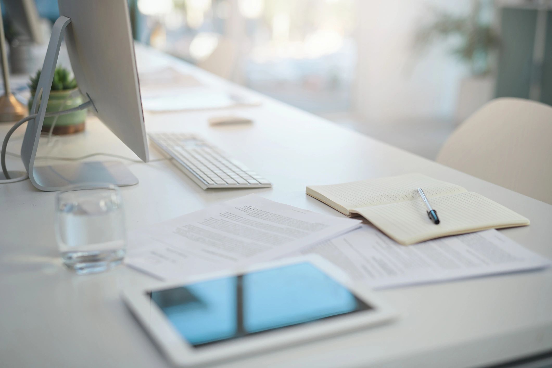 Desk with documents and office items