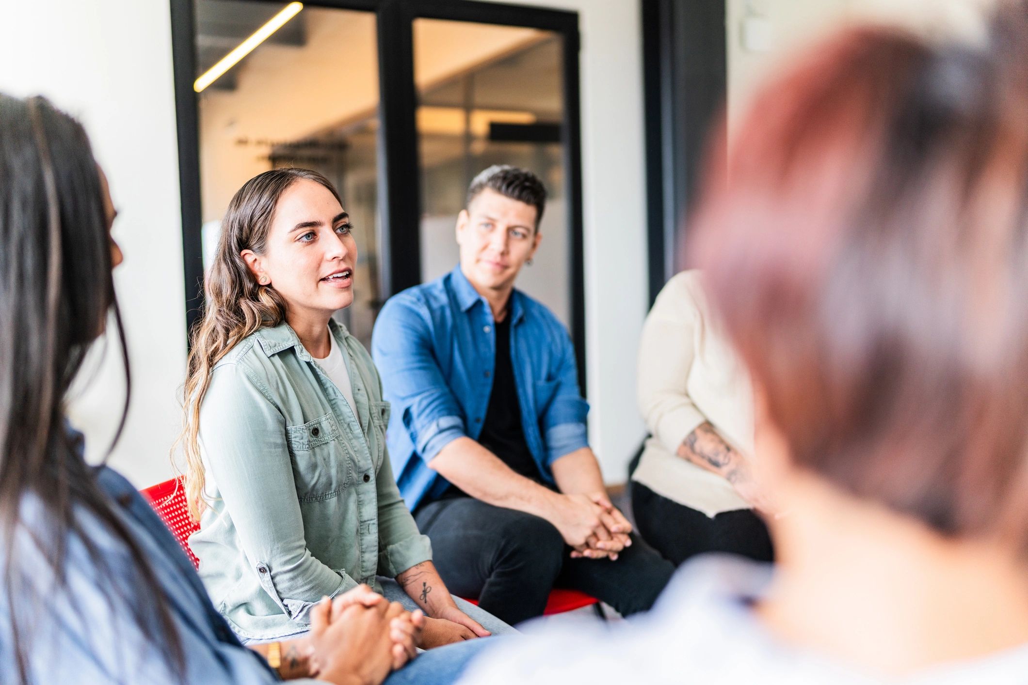Portrait of a professional speaking in a group setting